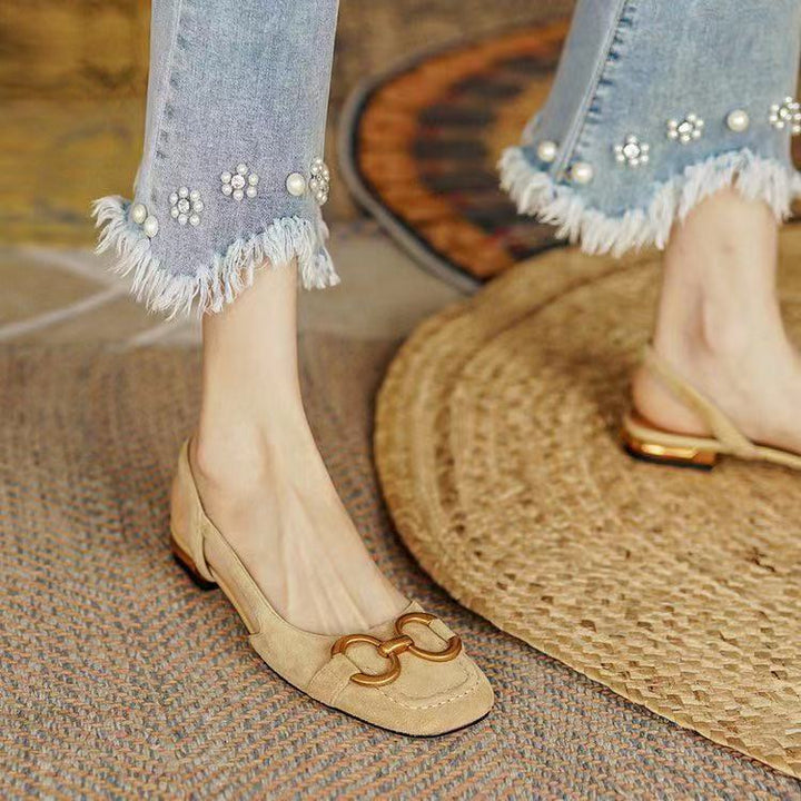 Smart blue women's slingback flats, combining comfort with a stable low heel for sophisticated steps.