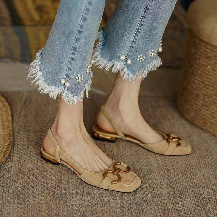 Cream women's versatile slingback flats, comfortable with a chic stable low heel for endless outfits.