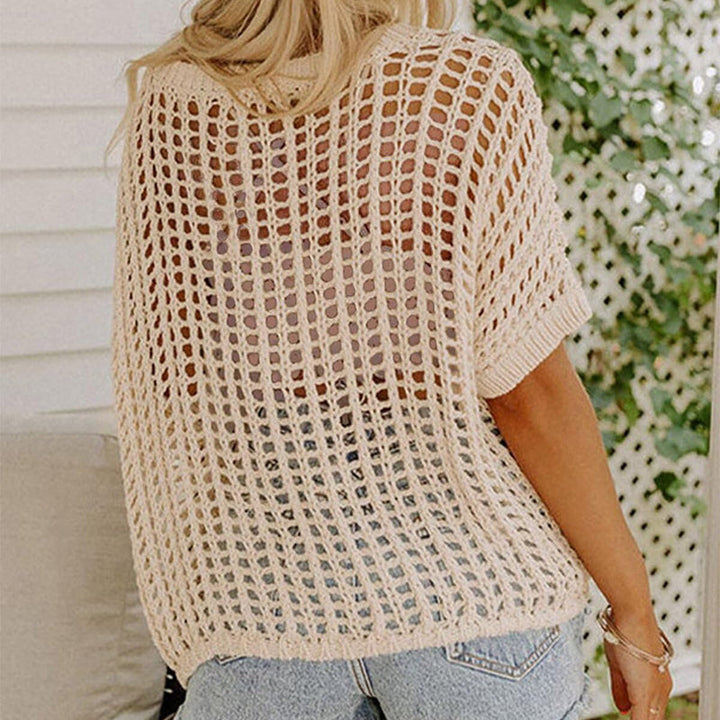 Apricot mesh short sleeve tee for women. Fashionable fishnet top, ideal layering shirt for a trendy look.