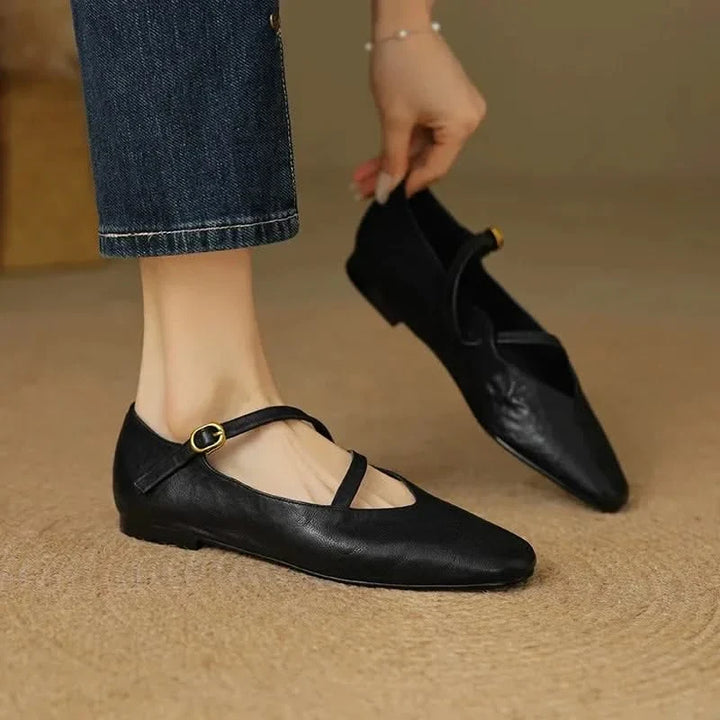 Women's Aria Comfort Flats with an adjustable strap & closed toe, ideal for secure everyday wear.