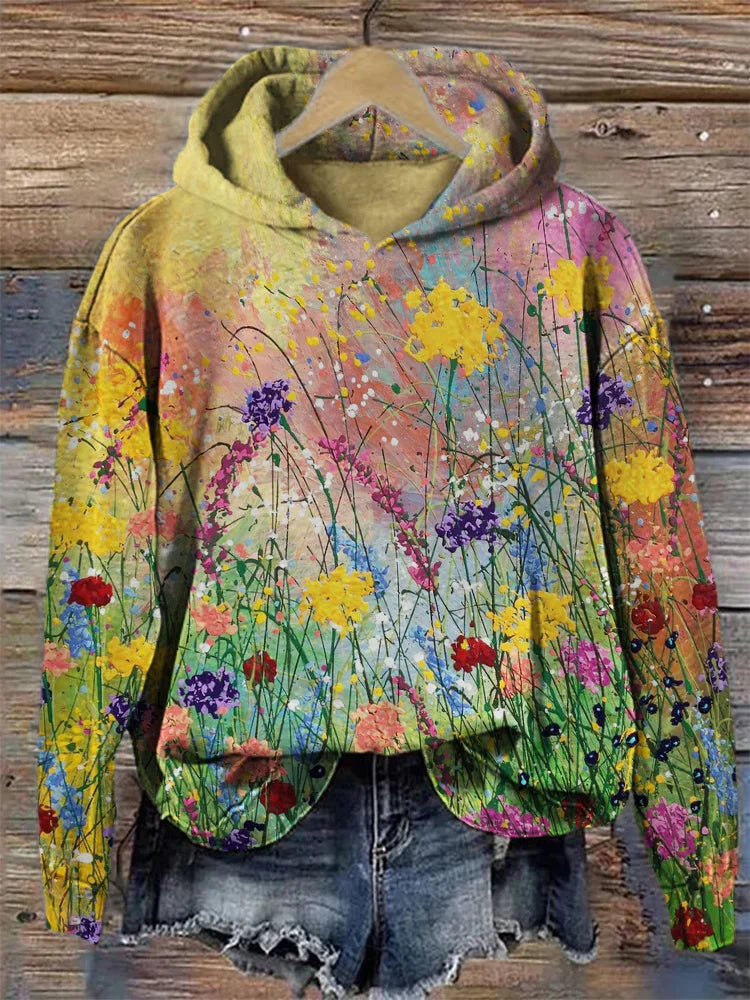 Women's artistic floral print hoodie, Nora. Cozy & stylish pullover with a unique design for everyday casual wear.
