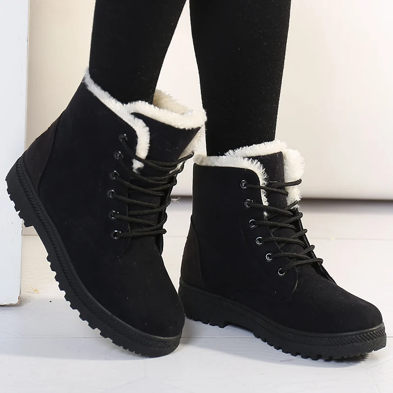 Front view of Women's Aspen snow boots, featuring lace-up design & durable exterior for winter adventures.