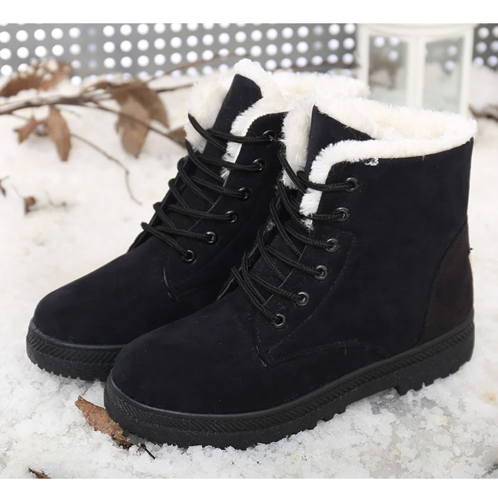 Cozy Women's Aspen plush boots, perfect for staying warm indoors or out during the cold winter months.