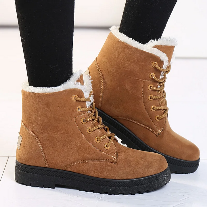 Stylish side profile of Women's Aspen plush winter boots, an elegant choice for cold weather fashion.