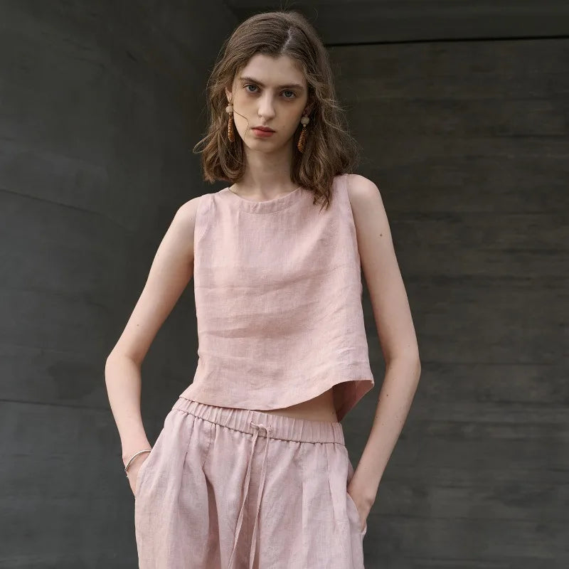 Stylish women's modern asymmetric crop top, sleeveless, and featuring a comfortable crew neck.