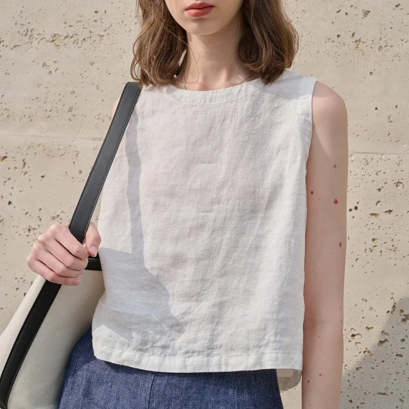 Versatile women's sleeveless asymmetric crop top with a crew neck, great for casual summer outfits.
