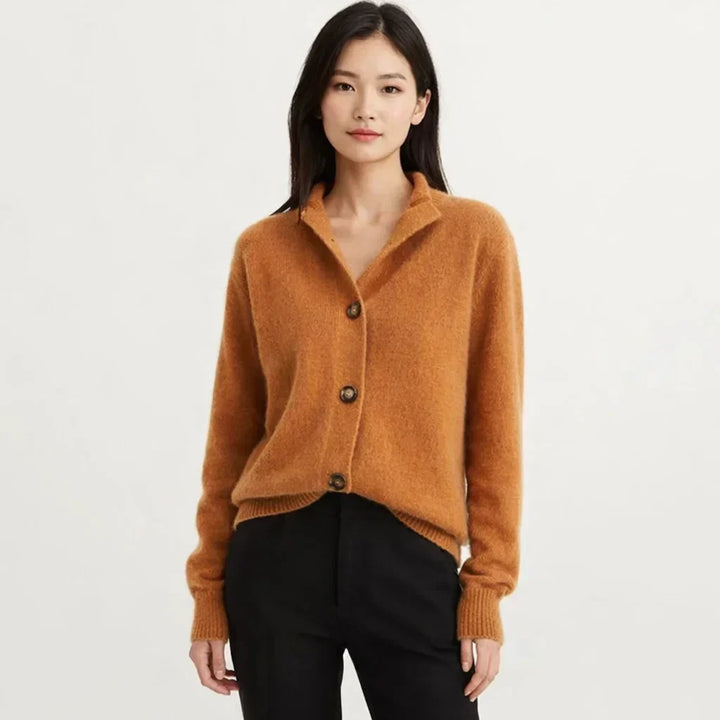 Women's asymmetrical button placket knit cardigan, a cozy and chic layering piece for fall fashion.