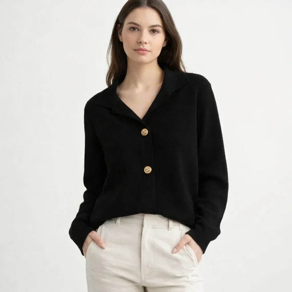 Soft, cozy knit women's cardigan, featuring an asymmetrical button placket, ideal for chic winter layering.