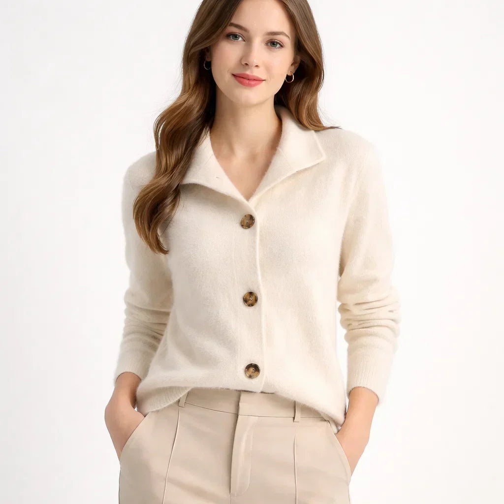 Full view of a women's asymmetrical knit cardigan, combining a relaxed fit with a chic button-up style.