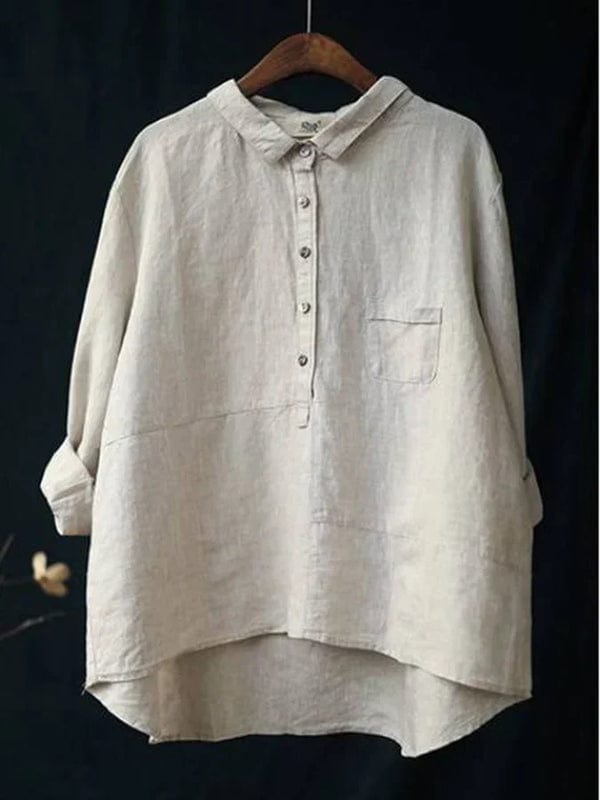 Chic women's long-sleeve asymmetrical button-up top, versatile for casual outings and everyday fashion.