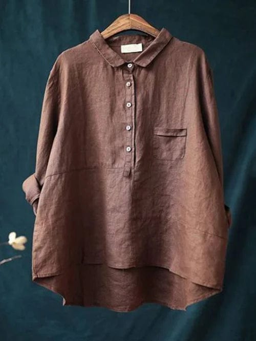 Stylish women's asymmetrical button-up shirt featuring long sleeves, ideal for a chic, casual look.