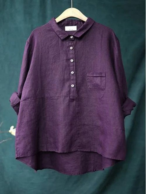 Fashionable women's asymmetrical blouse, a comfortable long-sleeve top for casual and chic everyday style.