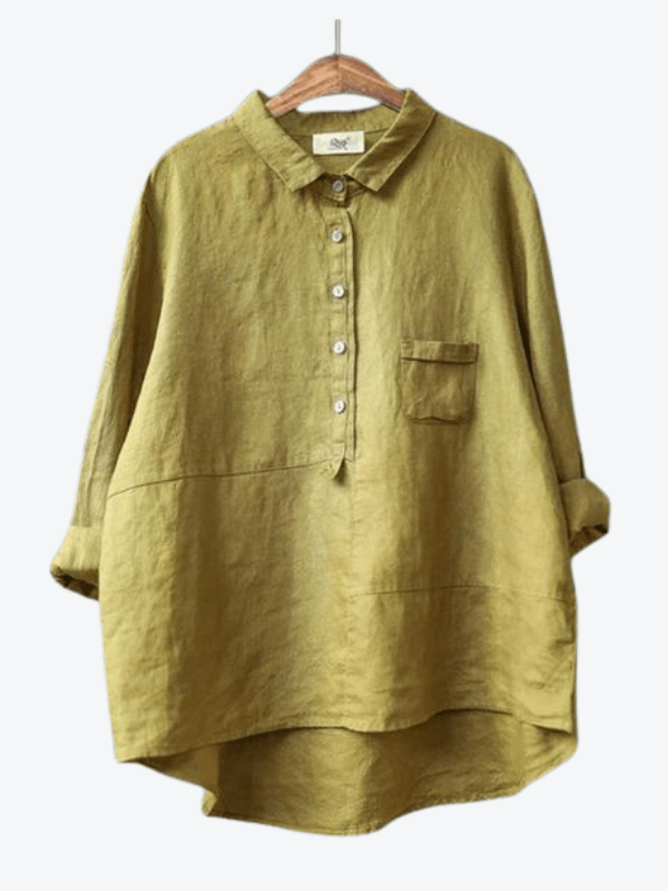 Versatile women's asymmetrical button-up blouse with a relaxed fit, perfect for modern casual fashion.