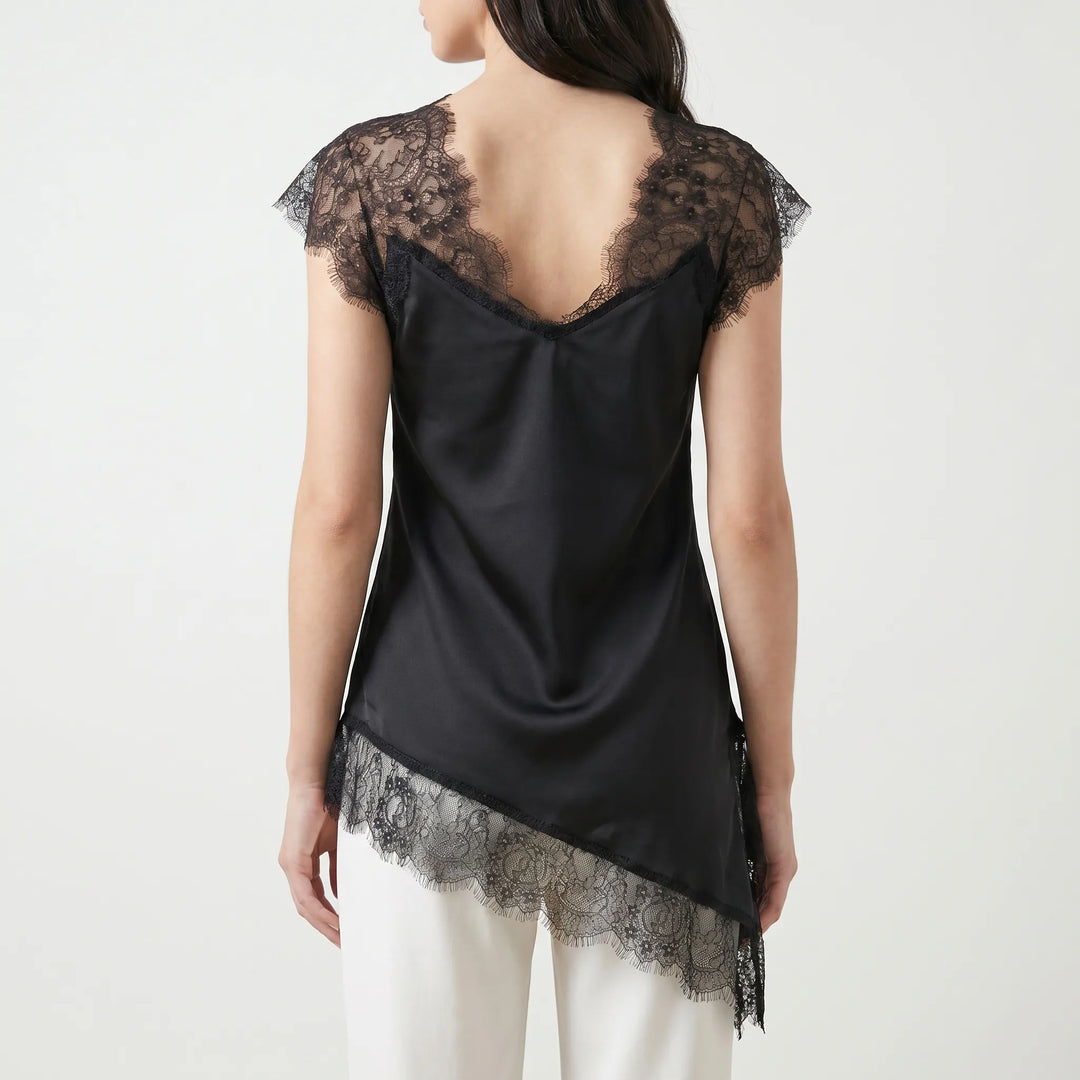 Sleeveless asymmetrical blouse featuring sheer detail & deep V-back. Elegant and versatile for any occasion.