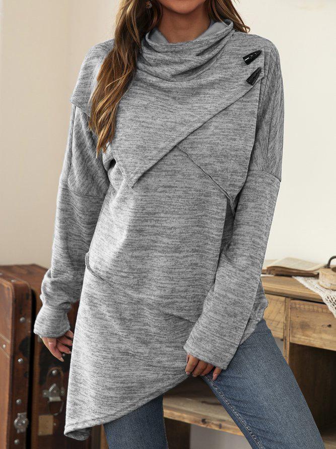 Women's modern asymmetrical long sleeve shirt with a flowing waterfall collar. Chic and comfortable fashion top.