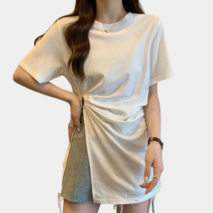 Women's asymmetrical knit top in black, modern chic style for versatile fashion.