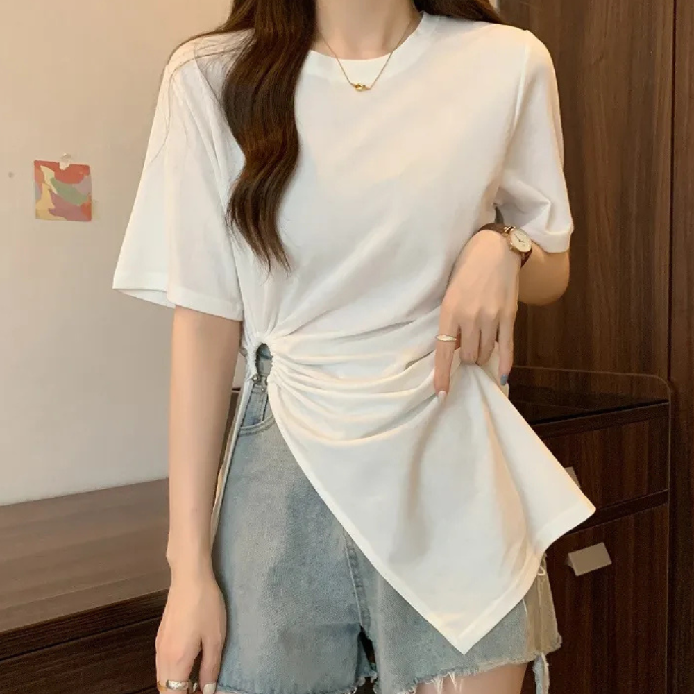 Elegant green women's asymmetrical knit top, perfect for a modern and chic wardrobe.