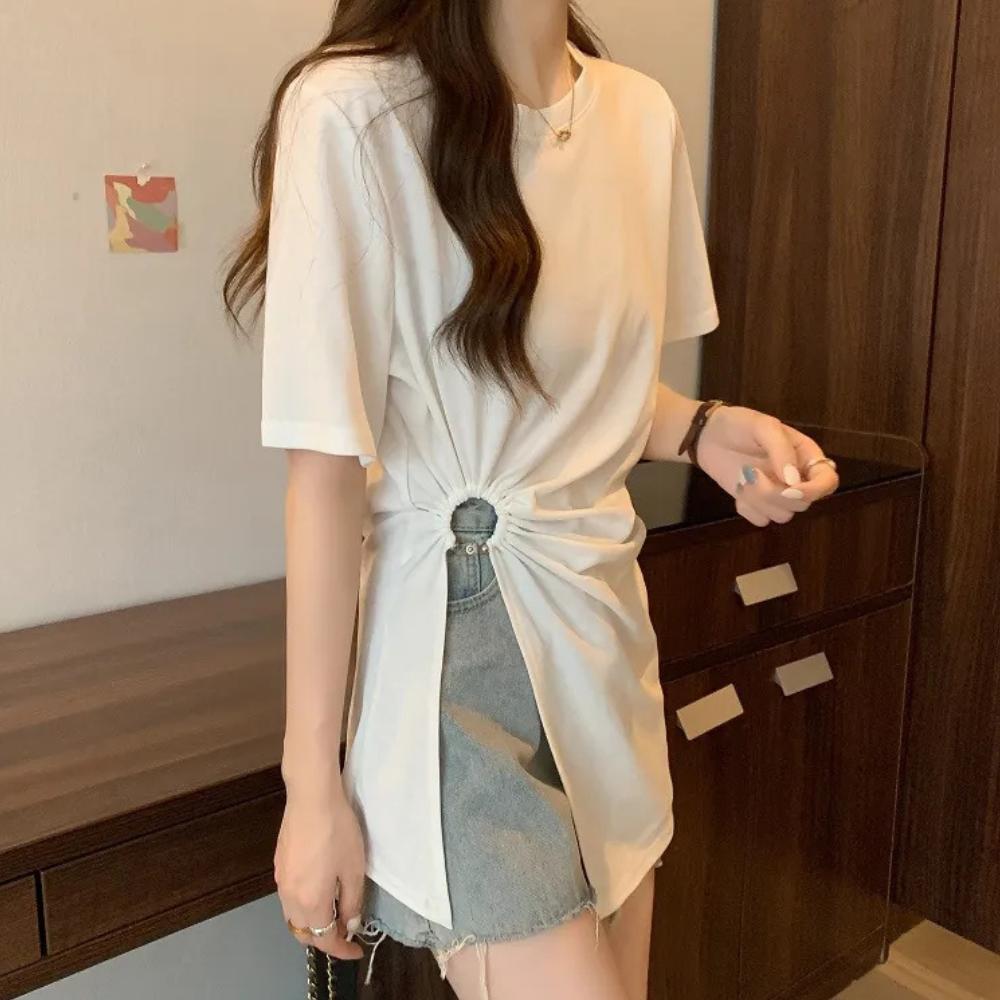 Versatile white women's asymmetrical knit top, ideal for modern casual and elegant wear.