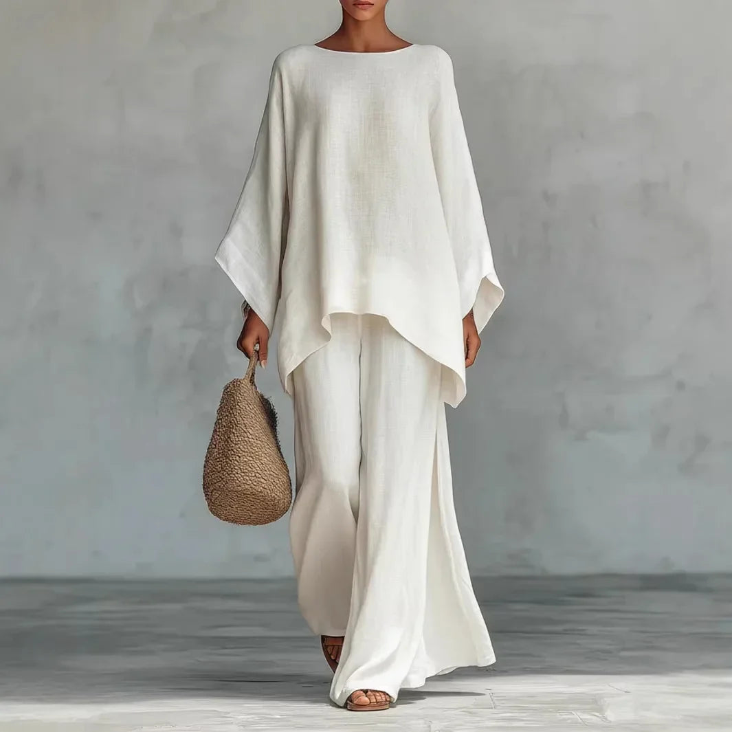 Women's asymmetrical two-piece set featuring a stylish top & comfortable wide-leg pants. Perfect for casual wear.