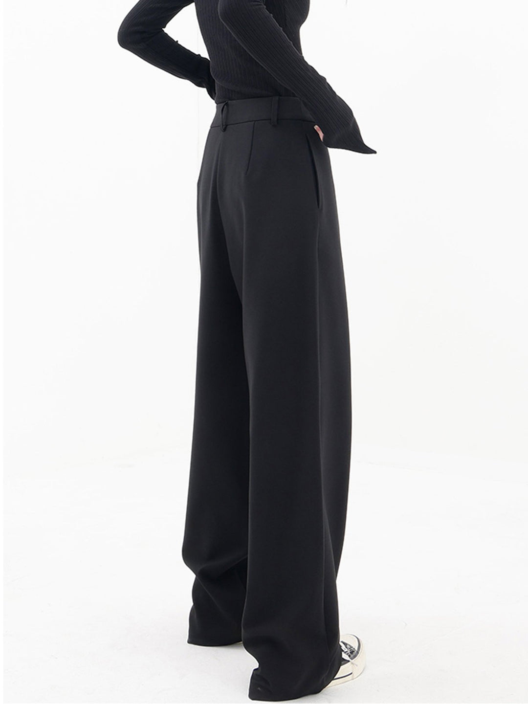 Fashionable women's wide leg comfort pants with an asymmetrical design for casual chic outfits. Dark brown.