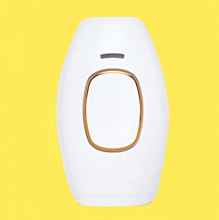 Woman holding a compact at-home laser hair removal device for painless body & face hair reduction.