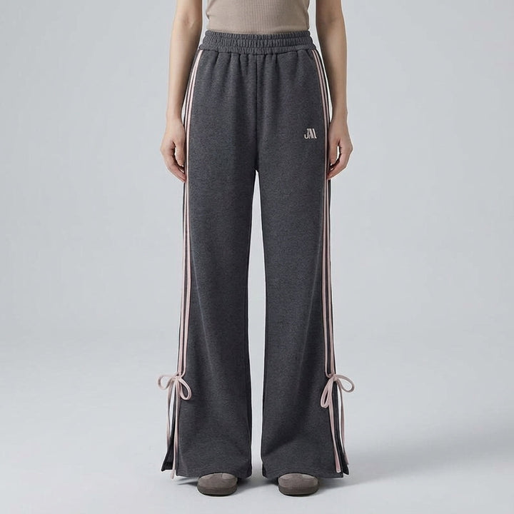 Tina athleisure jogger pants for women, grey with white stripes, elastic waist and decorative bow detail