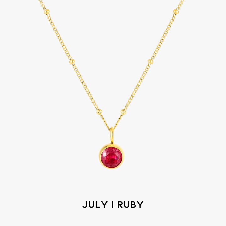 Aurora birthstone necklace displayed on an elegant jewelry stand, personalized gift.