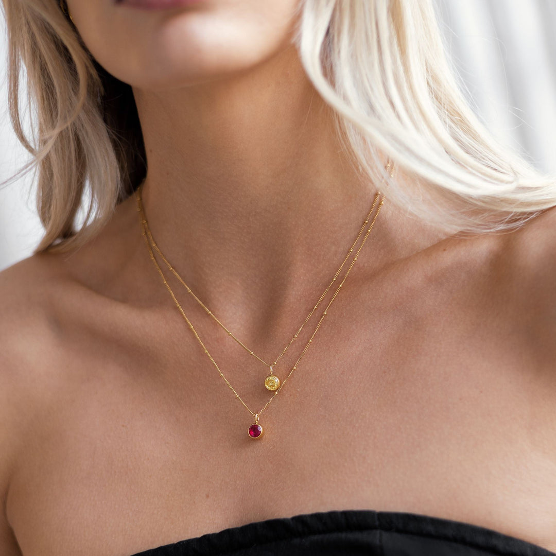 Hypoallergenic Aurora birthstone necklace, water-resistant personalized gift.