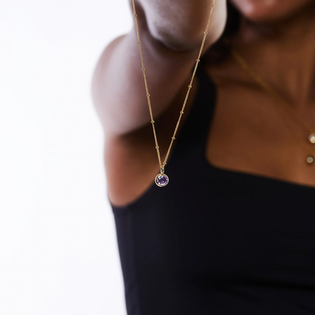 Elegant gold Aurora birthstone necklace, personalized gemstone jewelry for women.