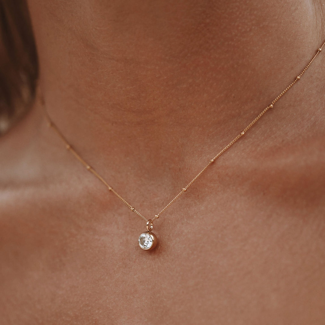 Custom women's birthstone necklace with unique gemstone, personalized jewelry.