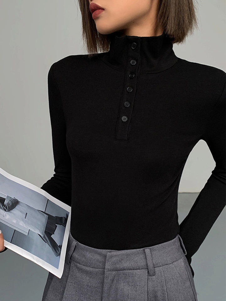 Stylish women's Aurora funnel neck jumper, perfect for casual wear, featuring elegant button details and soft fabric.