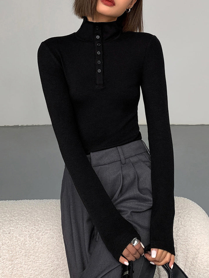 Soft rayon blend Aurora women's funnel neck jumper, long sleeve, with chic button accents for comfort and style.
