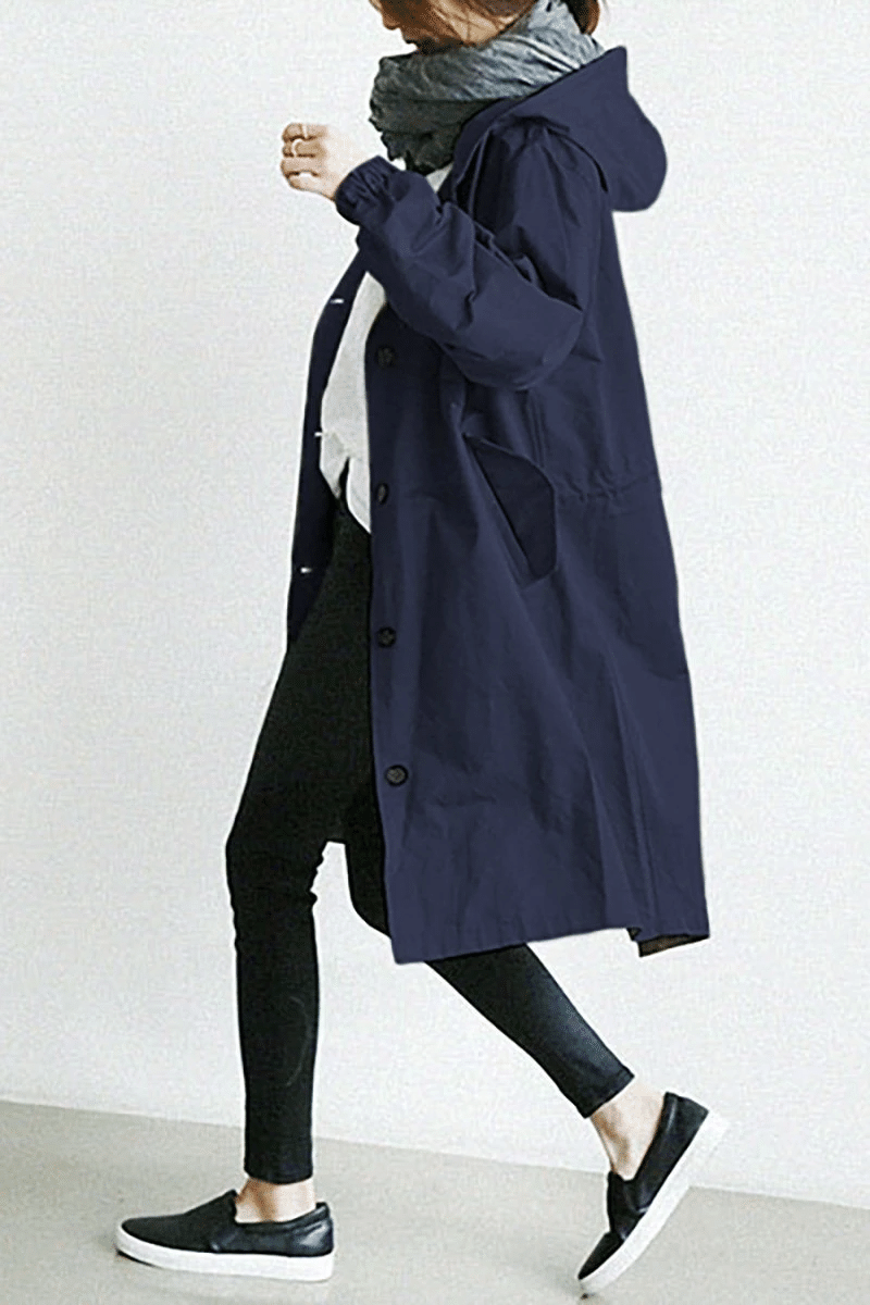 Fall Aurora hooded windbreaker for women, a sleek & lightweight outerwear jacket, perfect for transitional weather.