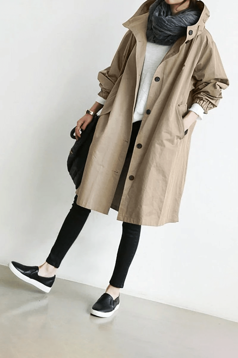 Aurora women's lightweight rain jacket, water-resistant and packable, great for travel & sudden showers.