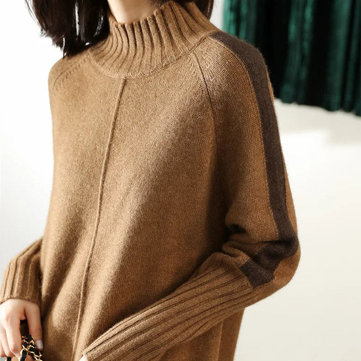 Stylish women's oversized sweater dress, relaxed fit with mock neck & ribbed details. Perfect for casual fall/winter.