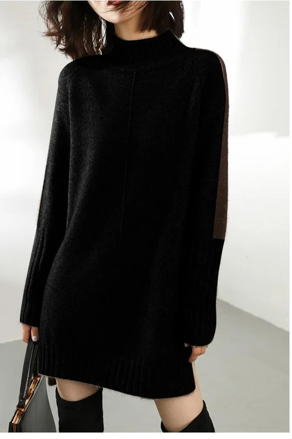 Black women's Aurora oversized sweater dress, chic & versatile. Mock neck design perfect for fall/winter fashion.