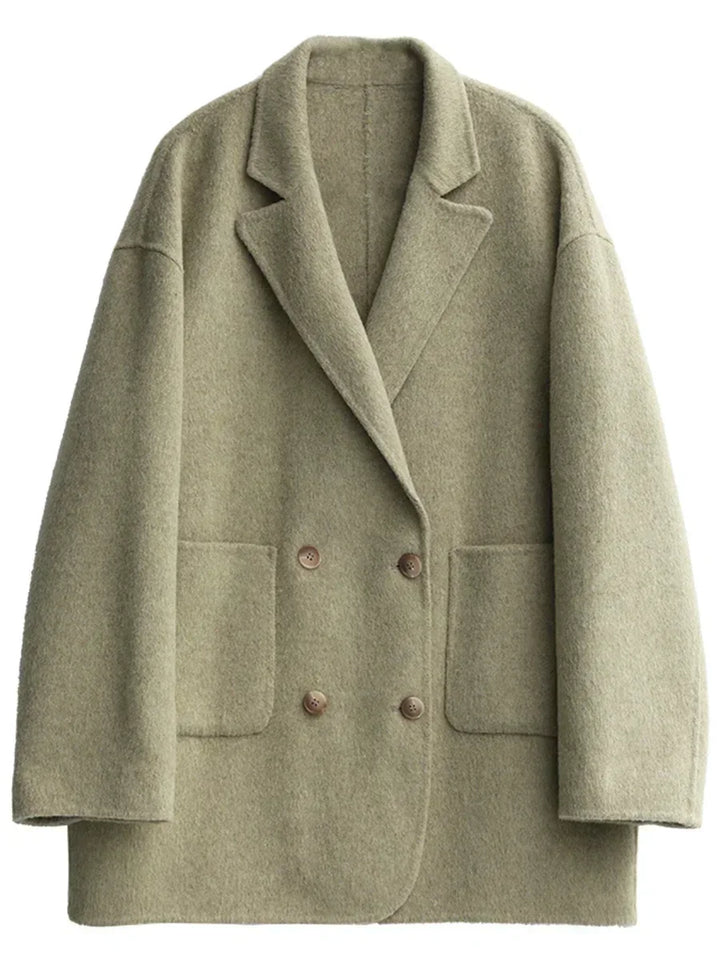 Luxe wool women's Aurora winter coat. Elegant & warm reversible design, perfect for sophisticated fall fashion outerwear.