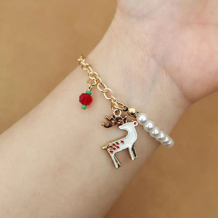 Adjustable stainless steel women's Christmas charm bracelet, perfect holiday gift.