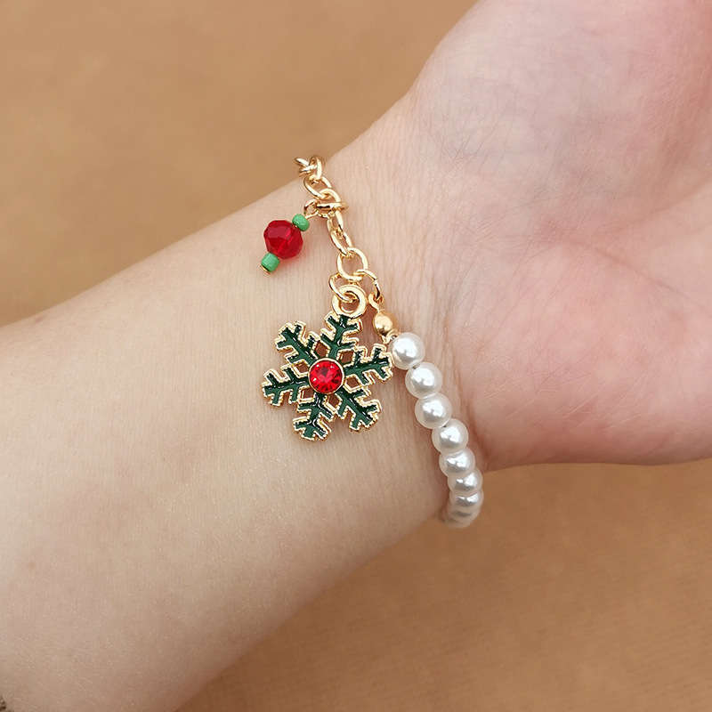 Festive pearl charm bracelet for women, Australian Christmas theme, a lovely seasonal accessory.