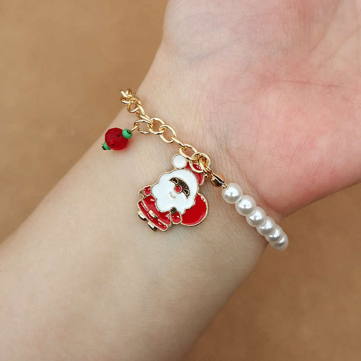 Women's Australian Christmas charm bracelet with pearl accents, Santa, Christmas tree, snowflake charms.