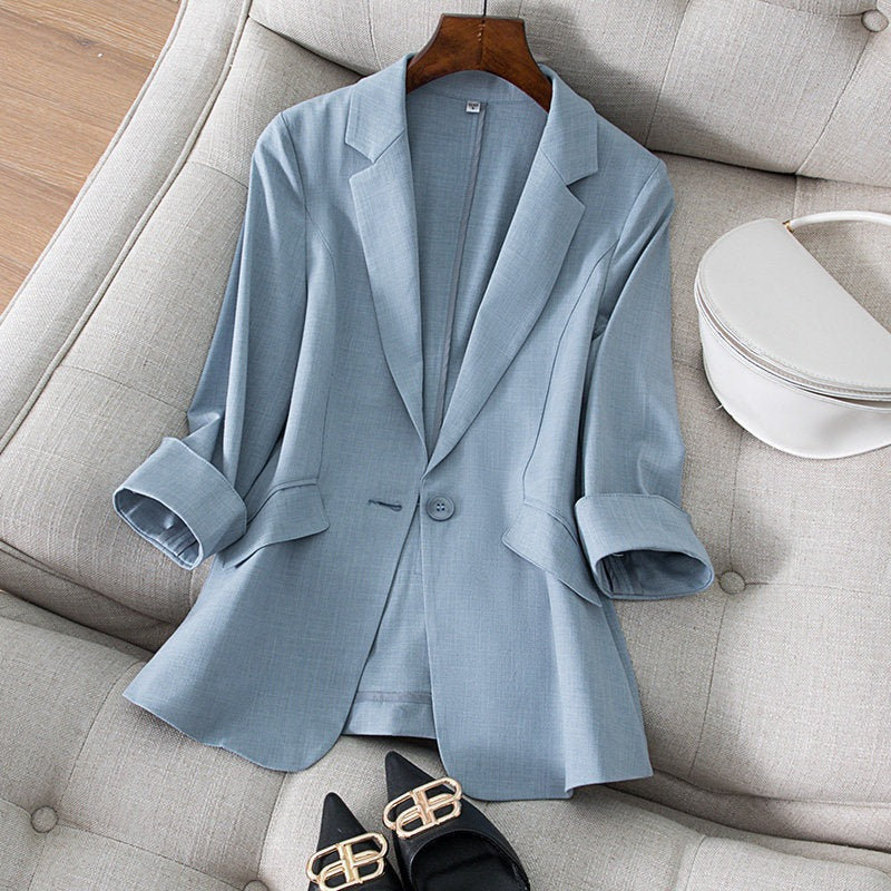 Model wearing Ava women's blazer with jeans, showcasing its versatile smart casual style and everyday comfort. Spring jacket.