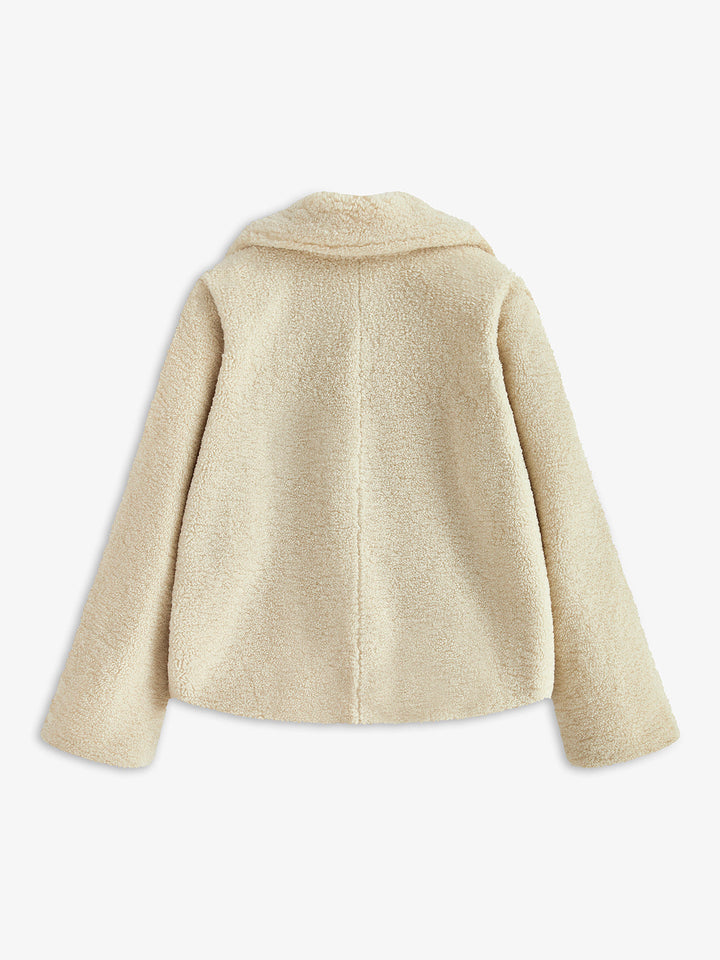 Plush Aveline teddy jacket for women, a stylish & warm outerwear choice for cold weather.