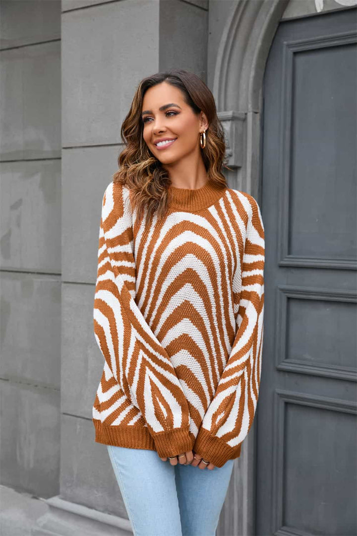 Soft women's azure printed round neck sweater. Comfortable long sleeve top, perfect for cozy fall & winter outfits.