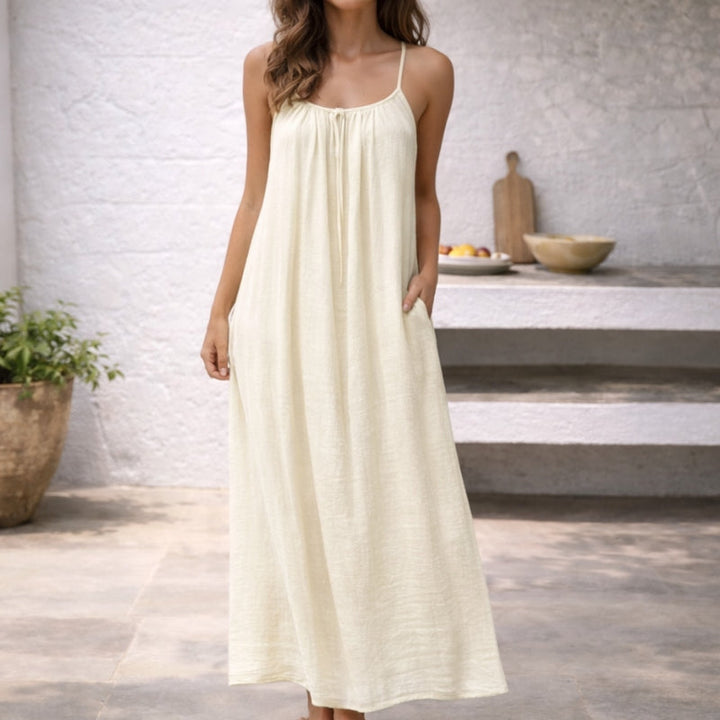 Model showcasing a stylish backless cami mini dress, perfect for summer fashion events.