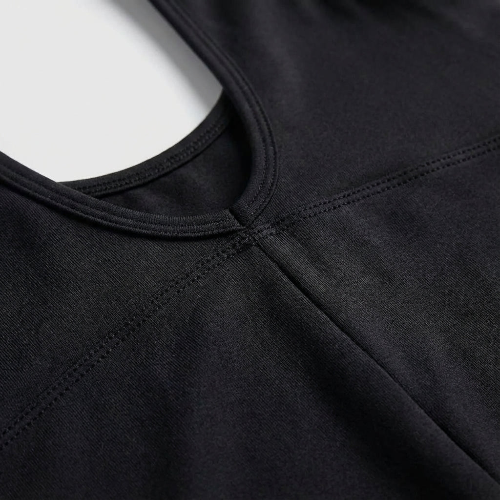 Sleek women's backless bodysuit in black, ideal for gym, Pilates, and active lifestyles.
