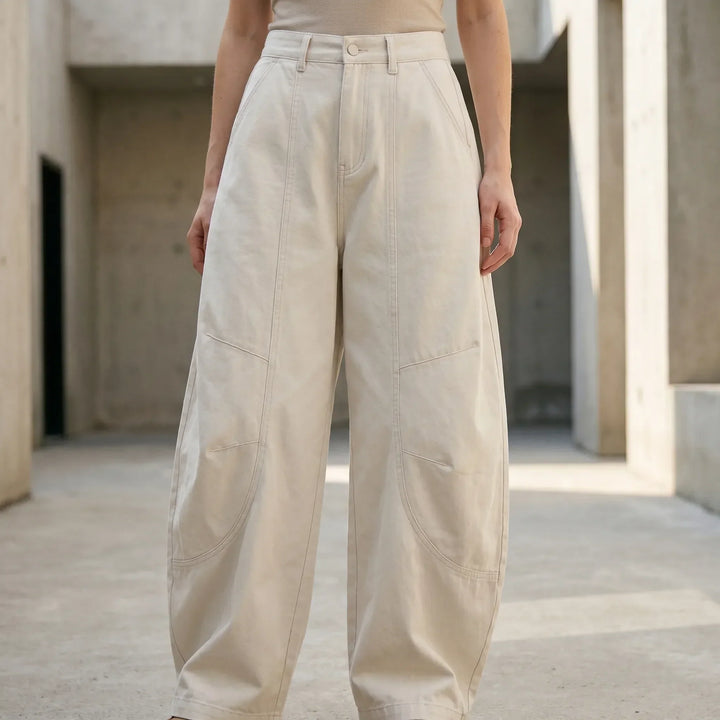Women's baggy barrel-leg jeans, low rise, loose fit, perfect for casual streetwear fashion.