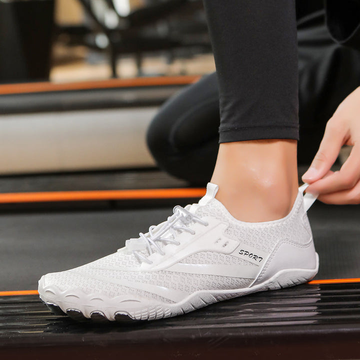 Lightweight minimalist athletic shoes for women, promoting agile & natural foot movement.