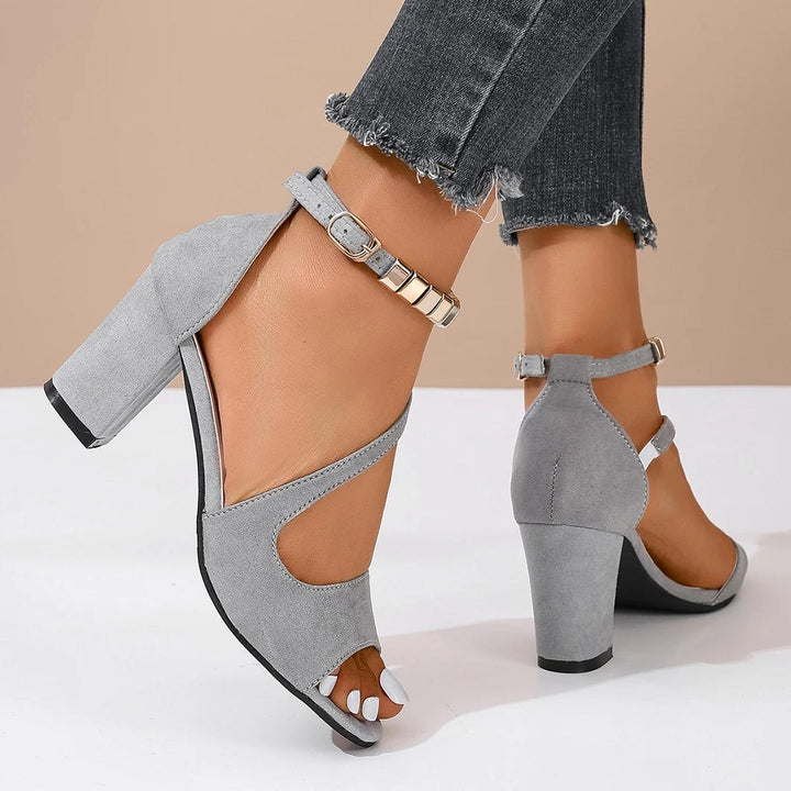 Women's sandals with stunning beaded ankle strap, open toe design, and supportive block heel for comfort.