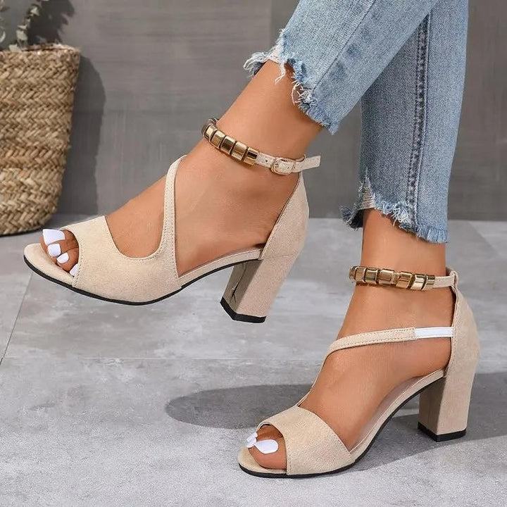 Versatile women's block heel sandals for casual elegance, featuring a beaded ankle strap and open toe.