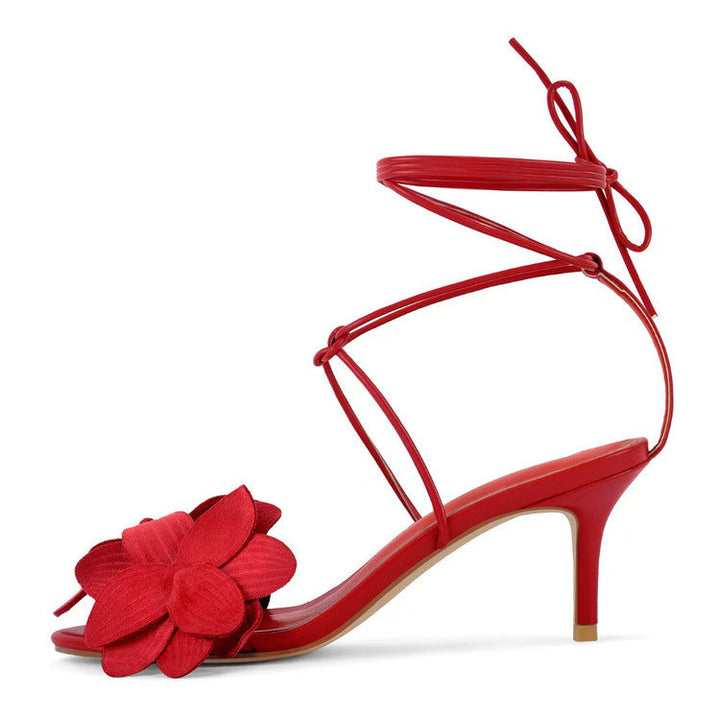 Chic women's Beatrice kitten heel sandals. Floral pattern, open toe, and sophisticated ankle ties.